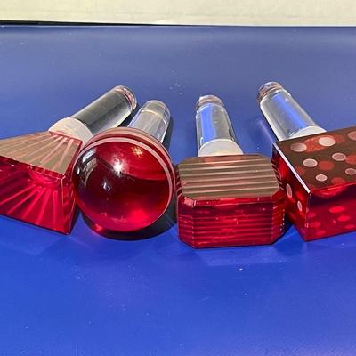 Vintage 4-Piece Mikasa Red Glass Wine Bottle Stoppers Slightly Used Condition as Pictured.