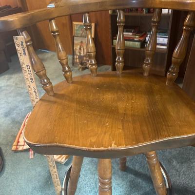 wooden bar barrel stool and two thrown blankets