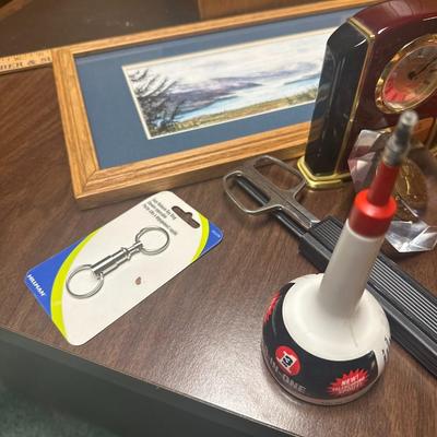 office supplies, art work, trash can