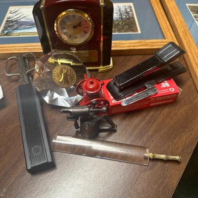 office supplies, art work, trash can