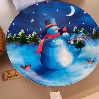 Christmas lot with thrown blankets and Bin