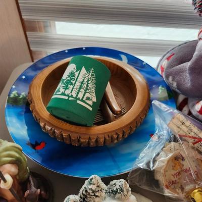 Christmas lot with thrown blankets and Bin