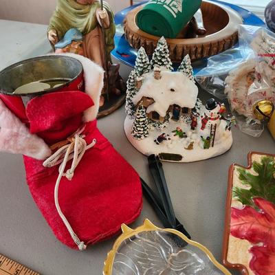 Christmas lot with thrown blankets and Bin