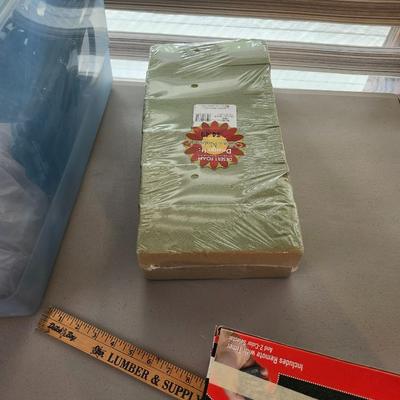 Christmas lot with thrown blankets and Bin