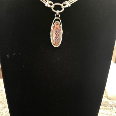 Silver toned choker with multicolored pendant
