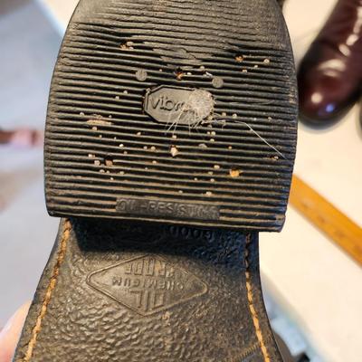 Three pair of Cowboy boot and wooden boot jack