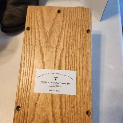 Three pair of Cowboy boot and wooden boot jack