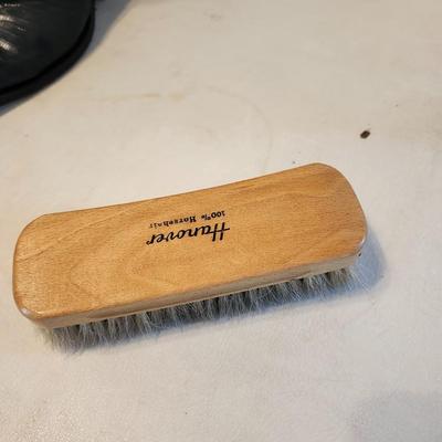 Three Pair of cowboy boots and Boot brush