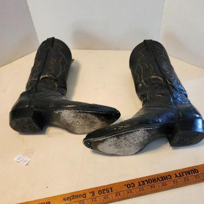 Three Pair of cowboy boots and Boot brush