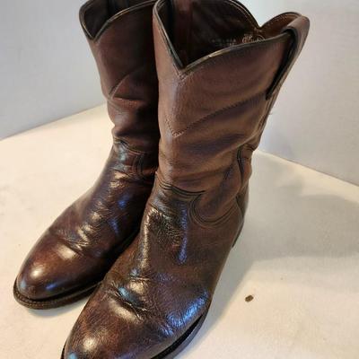Three Pair of cowboy boots and Boot brush