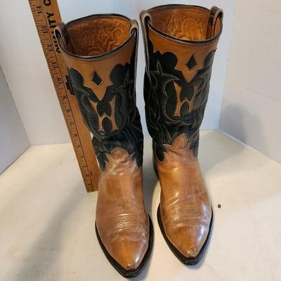 Three Pair of cowboy boots and Boot brush