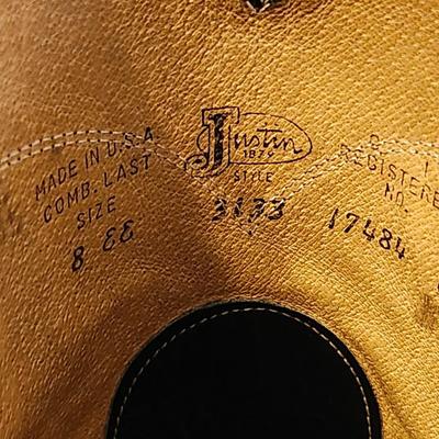 Three Pair of cowboy boots and Boot brush
