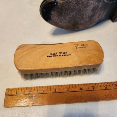 Three Pair of cowboy boots and Boot brush