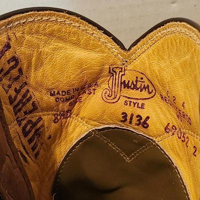 Three Pair of cowboy boots and Boot brush