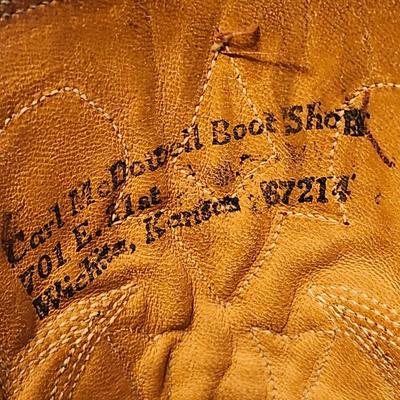 Three Pair of cowboy boots and Boot brush