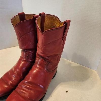 Three Pair of cowboy boots and Boot brush