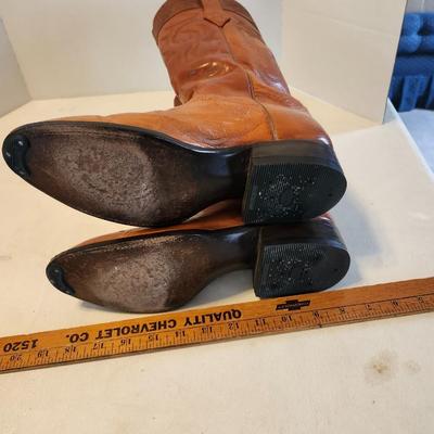 Three Pair of cowboy boots and Boot brush