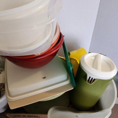 Kitchen plastic food containers including some Tupperware and other accessories