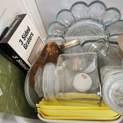 Kitchen plastic food containers including some Tupperware and other accessories