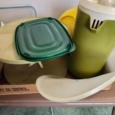 Kitchen plastic food containers including some Tupperware and other accessories
