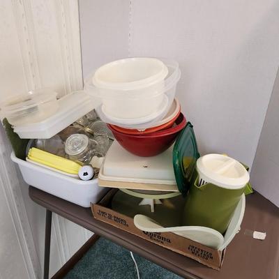 Kitchen plastic food containers including some Tupperware and other accessories