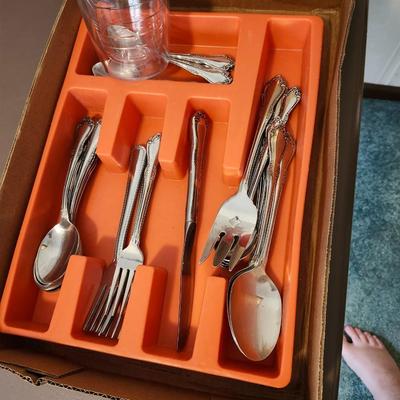 Kitchen plastic food containers including some Tupperware, silverware and other accessories