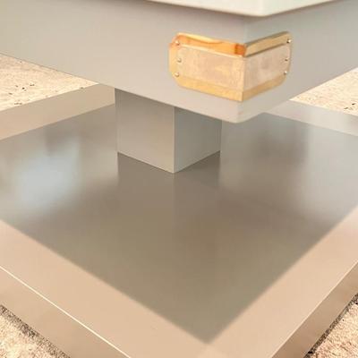 Marble Top Pedestal Style Coffee Table With Metal Corner Brackets