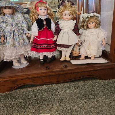 Four Vintage Porcelain head, legs and arms doll