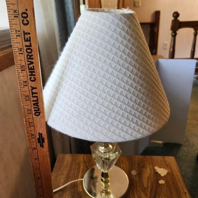 Two end tables, Lamp, wall art picture, Chair on rollers