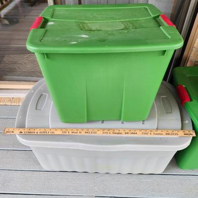 Four plastic bins tubs