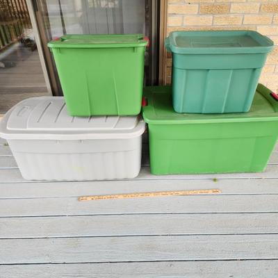 Four plastic bins tubs