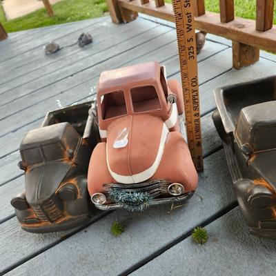 Outdoor decorations three heavy trucks that have been used as planters