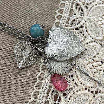 Silver toned heart locket necklace