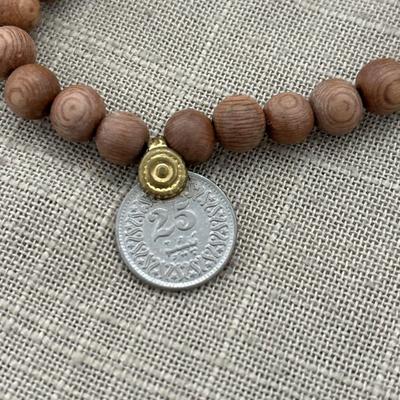 Wooden beaded bracelet with old coin