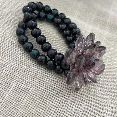 Black beaded stretchy bracelet with flower stone gem