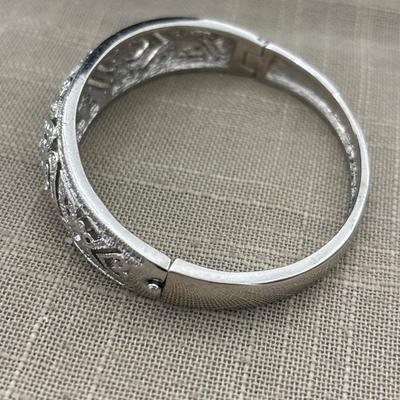 Silver tone cuff magnetic close bracelet