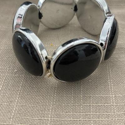 Silver tone plastic black stretchy bracelet
