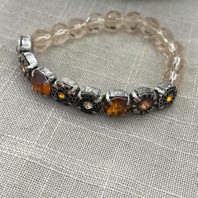 Orange gem and clear beaded bracelet