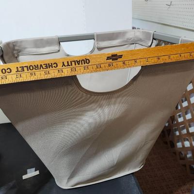 Two Cloth laundry baskets and seat cushions