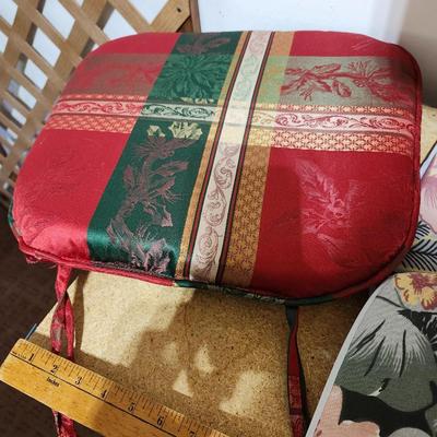 Two Cloth laundry baskets and seat cushions