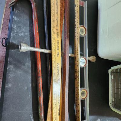 Miscellaneous house including yardsticks, pet carrier coolers