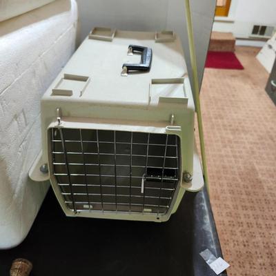 Miscellaneous house including yardsticks, pet carrier coolers