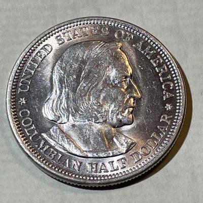 1892 AU58/UNCIRCULATED CONDITION COLUMBIAN EXPOSITION COMMEMORATIVE SILVER HALF DOLLAR COIN AS PICTURED.