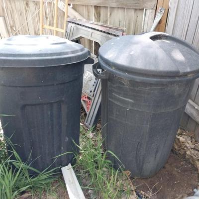 TWO TRASHCANS WITH LIDS