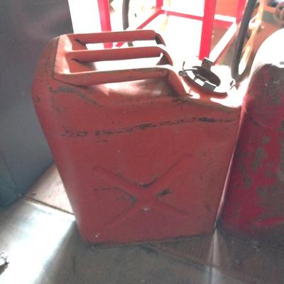 TWO VINTAGE METAL RED CANS