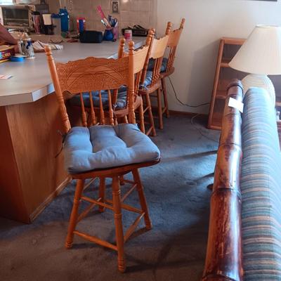 LIKE NEW 4 OAK SWIVEL BAR STOOLS