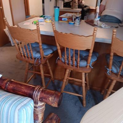 LIKE NEW 4 OAK SWIVEL BAR STOOLS