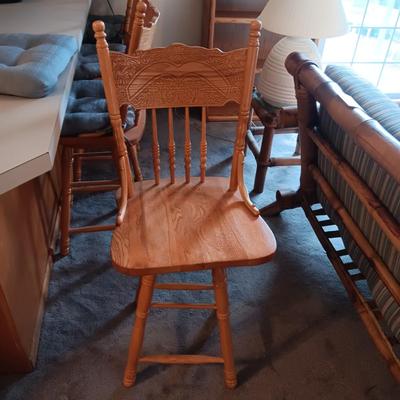 LIKE NEW 4 OAK SWIVEL BAR STOOLS