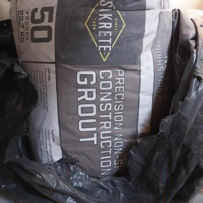 BAGS OF CONCRETE MIX AND GROUT