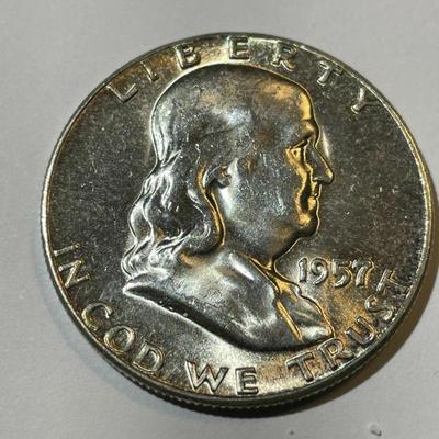 1957-P BU CONDITION FRANKLIN SILVER HALF DOLLAR AS PICTURED.